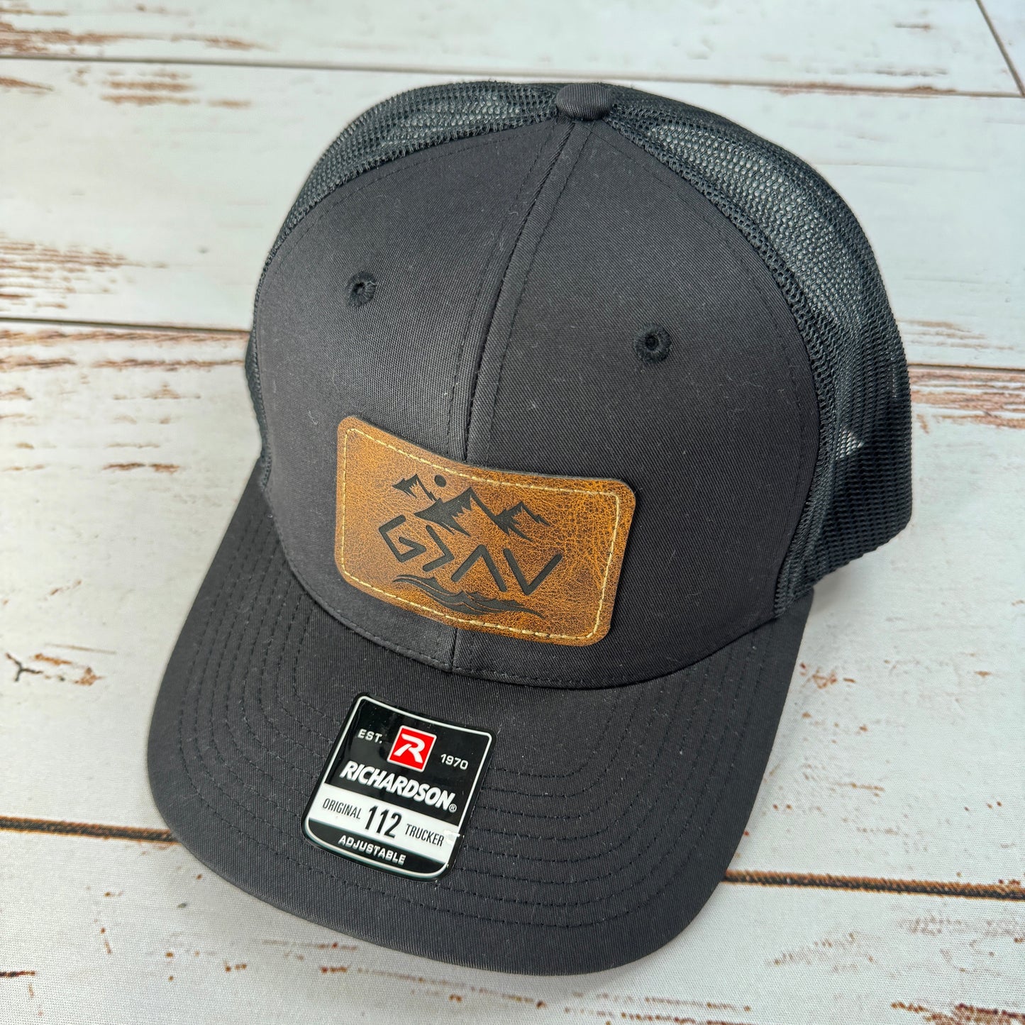 God Is Greater Patch (Black) Trucker Hat